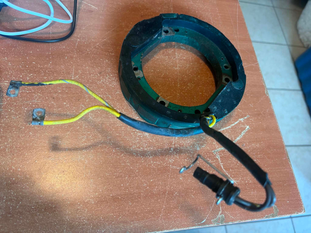 USED 581957 Johnson Evinrude Stator 60-75hp 3 Cyl. 9Amps